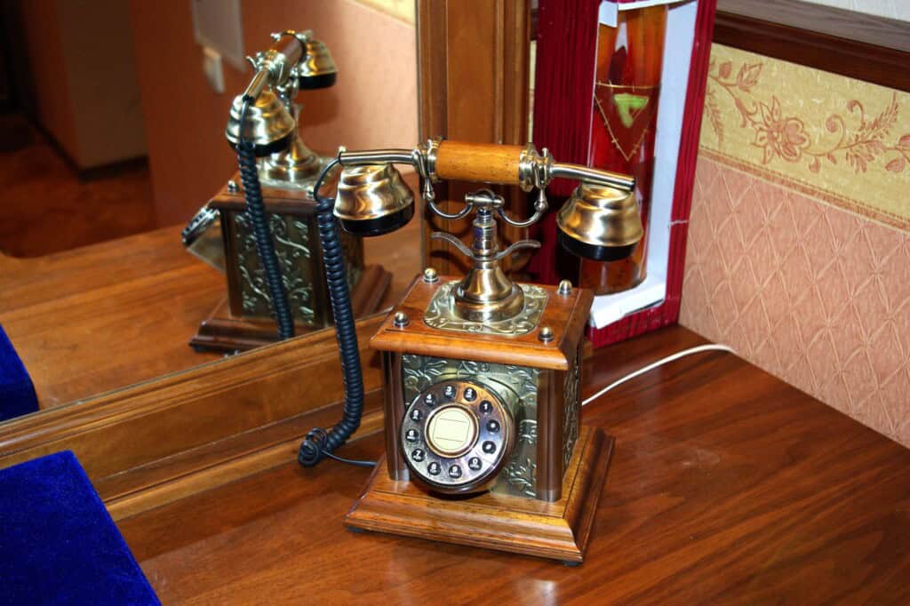 A closeup of an antique telephone